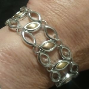 3 row linked chain bracelet stainless and brass .